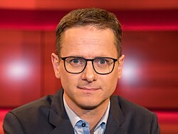 Carsten Linnemann in a television studio during the ARD talk show Hart aber fair